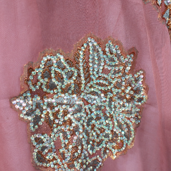 Orange Outline and Light-Green Beaded Dirac on Light Red Background